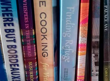 Wild Rising Books on a shelf