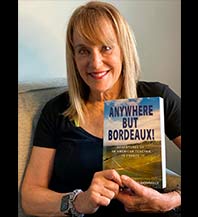 Jackie holding her book Anywhere but Bordeaux